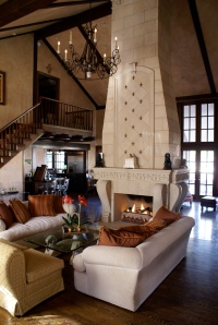 Fleur de lis fireplace with over mantel by Realm of Design