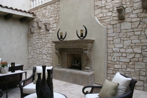 custom patio fireplace mantel & surround by Realm of Design